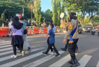 1761499959036-personel-mojang-lodaya-polwan-polres-bogor-melaksanakan-patroli-di-car-free-day-dokistimewa-1761492937086_169