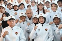 1765170355657-chef-de-mission-cdm-indonesia-reda-manthovani-seusai-memimpin-upacara-pelepasan-para-atlet-di-terminal-3-bandara-internasional-1765166985998_169