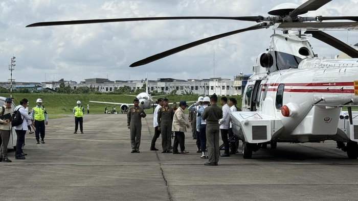 1765602327549-presiden-prabowo-subianto-melanjutkan-agenda-peninjauan-lokasi-bencana-ke-langkat-menggunakan-helikopter-dari-kota-medan-1765598528326_169