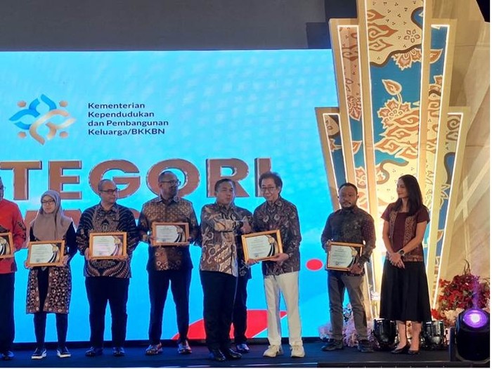 1765818339015-adv-sidomuncul-1765780623938