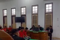 1765926277568-bapak-anak-pelaku-pembunuhan-sopir-di-medan-menjalani-sidang-putusan-di-pengadilan-negeripn-medan-selasa16122025-juitadetiksum-1765898801183_169