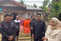 1766034352921-bantuan-polri-di-wilayah-terdampak-bencana-sumatera-1766031717263_169