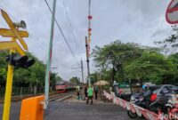 1766120766359-pembangunan-palang-perlintasan-kereta-api-1766074483300_169