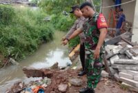 1769079976064-hujan-deras-picu-longsor-di-ciputat-tembok-rumah-warga-ambrol-1769076577419_169