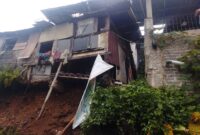 1769317537806-ilustrasi-rumah-pinggir-sungai-1769313822788